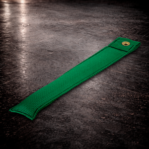 12 inch green marker with grommet on industrial surface long green fabric marker close up stitching detail
12 inch grip marker with metal grommet green green set marker large size on dark warehouse background
film production marker green color coded