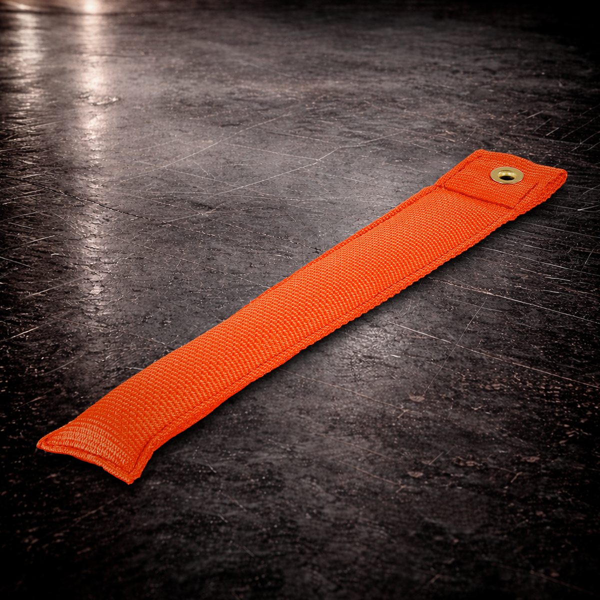 12 inch orange marker with grommet on industrial surface long orange fabric marker close up stitching detail
12 inch grip marker with metal grommet orange orange set marker large size on dark warehouse background
film production marker orange high visibility