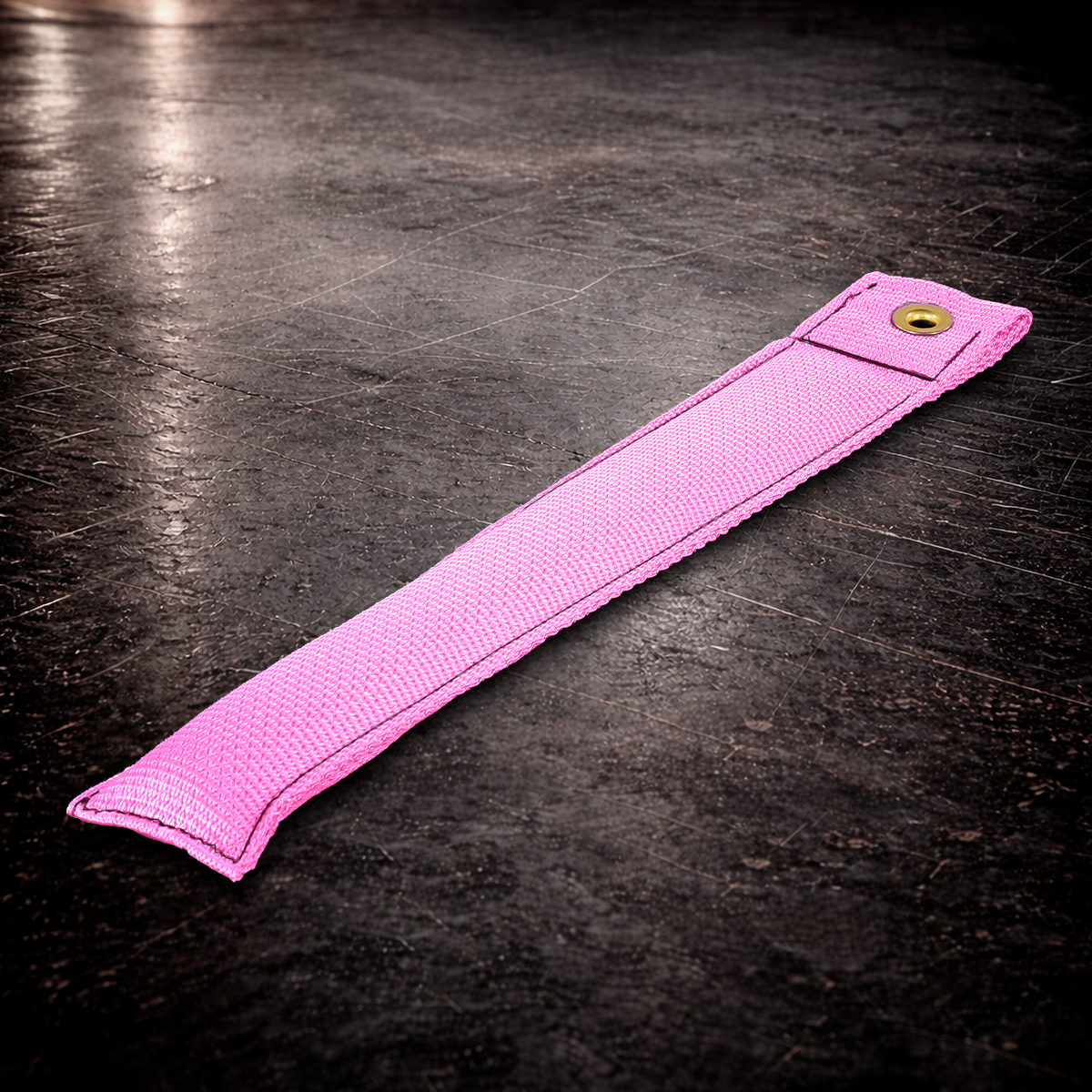 12 inch pink marker with grommet on industrial surface long pink fabric marker close up stitching detail
12 inch grip marker with metal grommet pink pink set marker large size on dark warehouse background film production marker pink high visibility