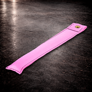 12 inch pink marker with grommet on industrial surface long pink fabric marker close up stitching detail
12 inch grip marker with metal grommet pink pink set marker large size on dark warehouse background film production marker pink high visibility