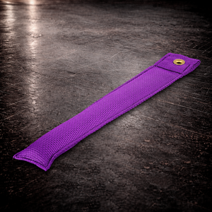 12 inch purple marker with grommet on industrial surface long purple fabric marker close up stitching detail
12 inch grip marker with metal grommet purple purple set marker large size on dark warehouse background
film production marker purple color coded