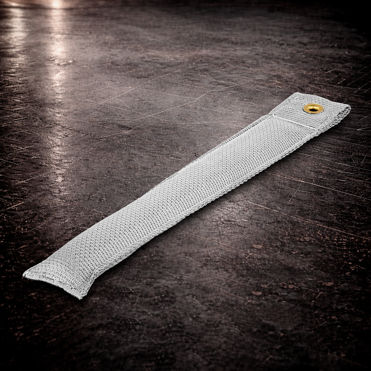 12 inch white marker with grommet on industrial surface long white fabric marker close up stitching detail
12 inch grip marker with metal grommet white white set marker large size on dark warehouse background
film production marker white high contrast
