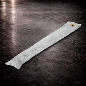 12 inch white marker with grommet on industrial surface long white fabric marker close up stitching detail
12 inch grip marker with metal grommet white white set marker large size on dark warehouse background
film production marker white high contrast