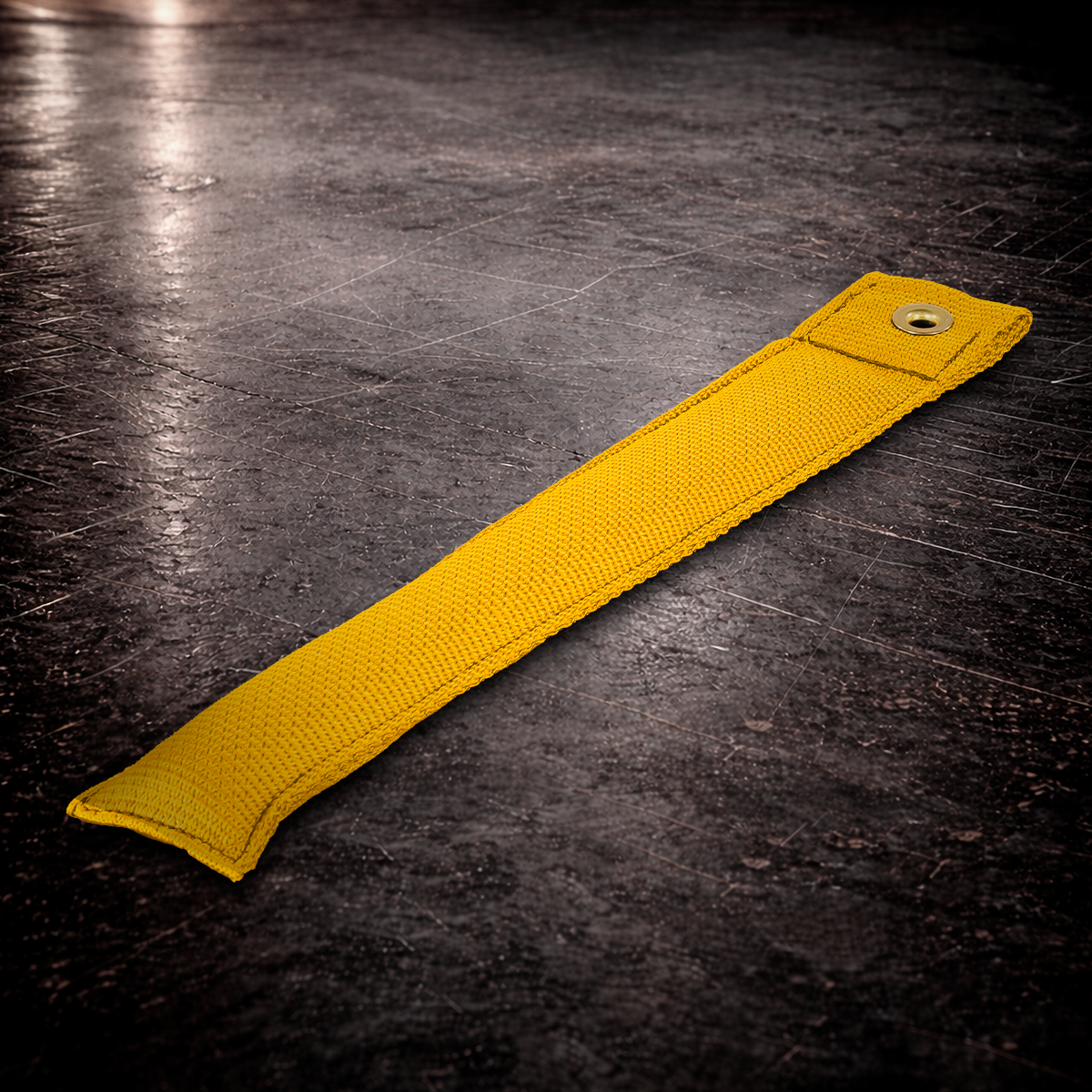 12 inch yellow marker with grommet on industrial surface long yellow fabric marker close up stitching detail
12 inch grip marker with metal grommet yellow yellow set marker large size on dark warehouse background
film production marker yellow high visibility