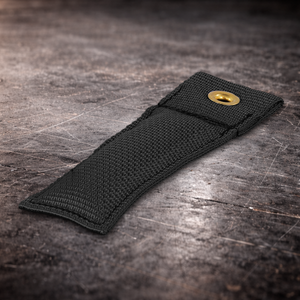 4 inch black marker with grommet on industrial surface black fabric marker flag close up stitching detail
4 inch grip marker with metal grommet black black set marker on dark warehouse background film production marker black with grommet
