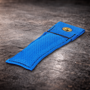 4 inch blue marker flag with grommet on industrial surface blue fabric marker flag close up stitching detail
4 inch grip marker flag with metal grommet blue blue set marker flag on dark warehouse background
film production marker flag blue with grommet