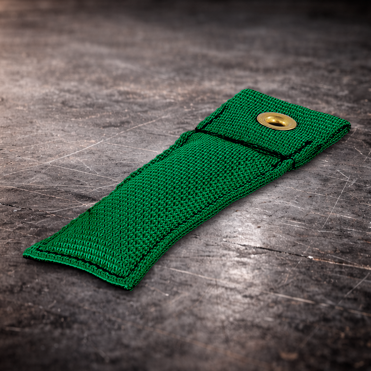 4 inch green marker with grommet on industrial surface green fabric marker flag close up stitching detail
4 inch grip marker with metal grommet green green set marker on dark warehouse background film production marker green with grommet