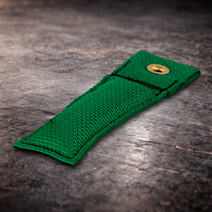 4 inch green marker with grommet on industrial surface green fabric marker flag close up stitching detail
4 inch grip marker with metal grommet green green set marker on dark warehouse background film production marker green with grommet