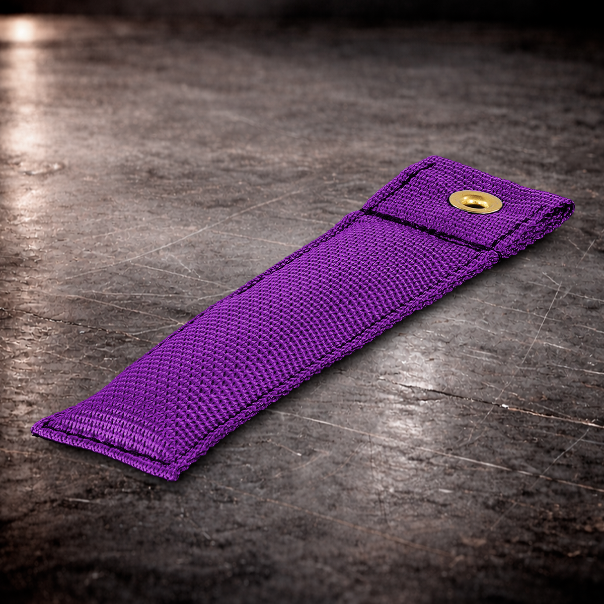 6 inch purple marker with grommet on industrial surface purple fabric marker flag close up stitching detail
6 inch grip marker with metal grommet purple purple set marker on dark warehouse background film production marker purple with grommet