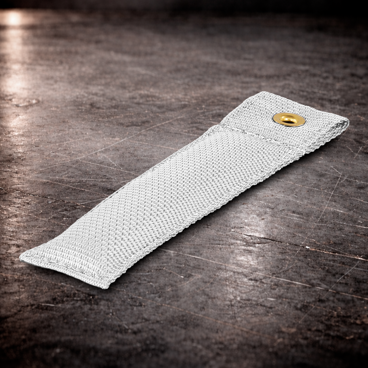 6 inch white marker with grommet on industrial surface white fabric marker flag close up stitching detail
6 inch grip marker with metal grommet white white set marker on dark warehouse background film production marker white with grommet
