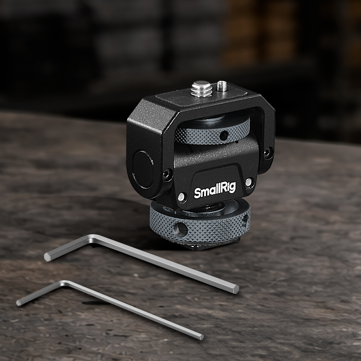 Adjustable monitor support with dual 1/4"-20 mounting threads for external monitors, camera cages, cinema cameras, DSLR and mirrorless filmmaking rigs.