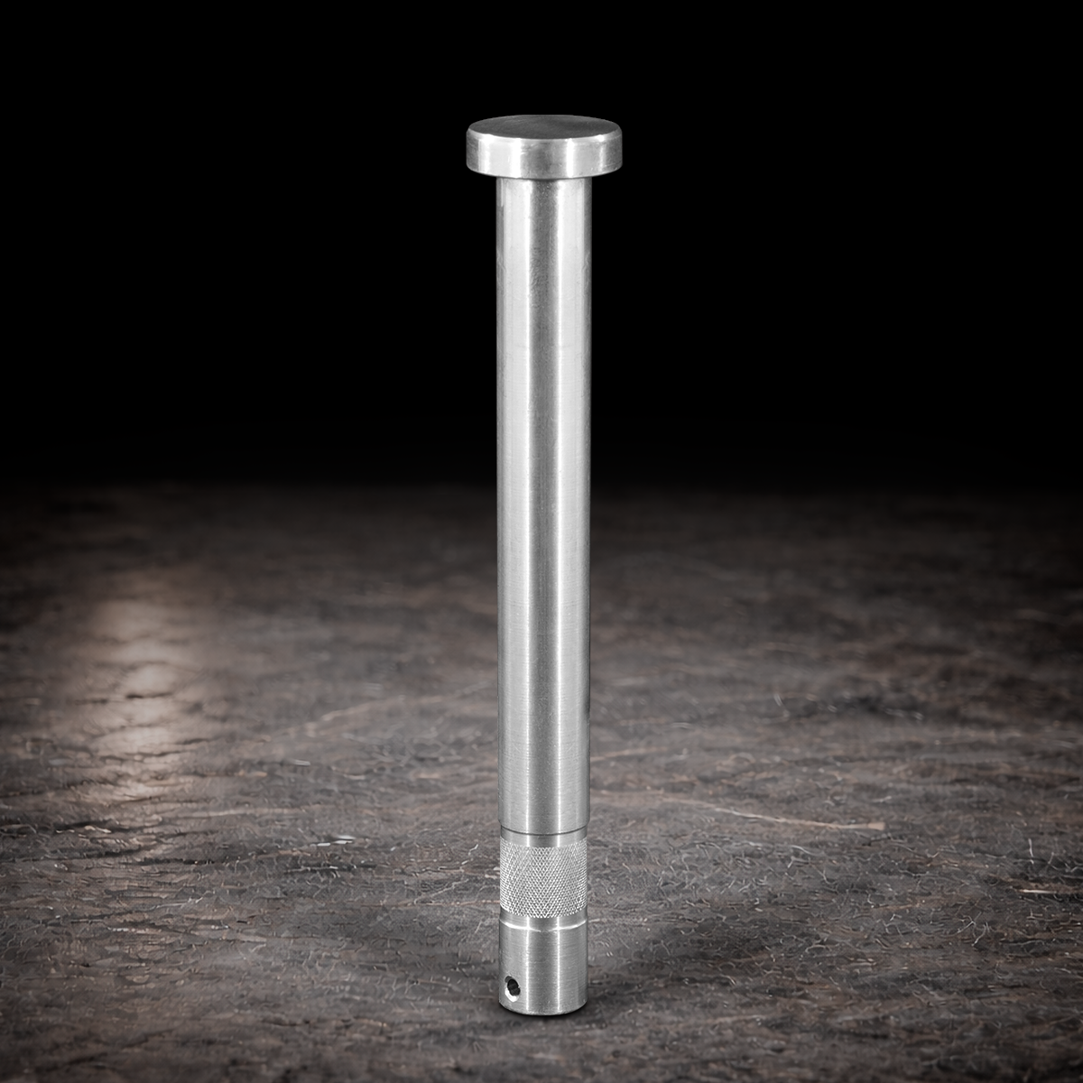 Aluminum 6 inch baby pin with keeper collar for film production grip equipment and studio lighting rigging on dark textured background