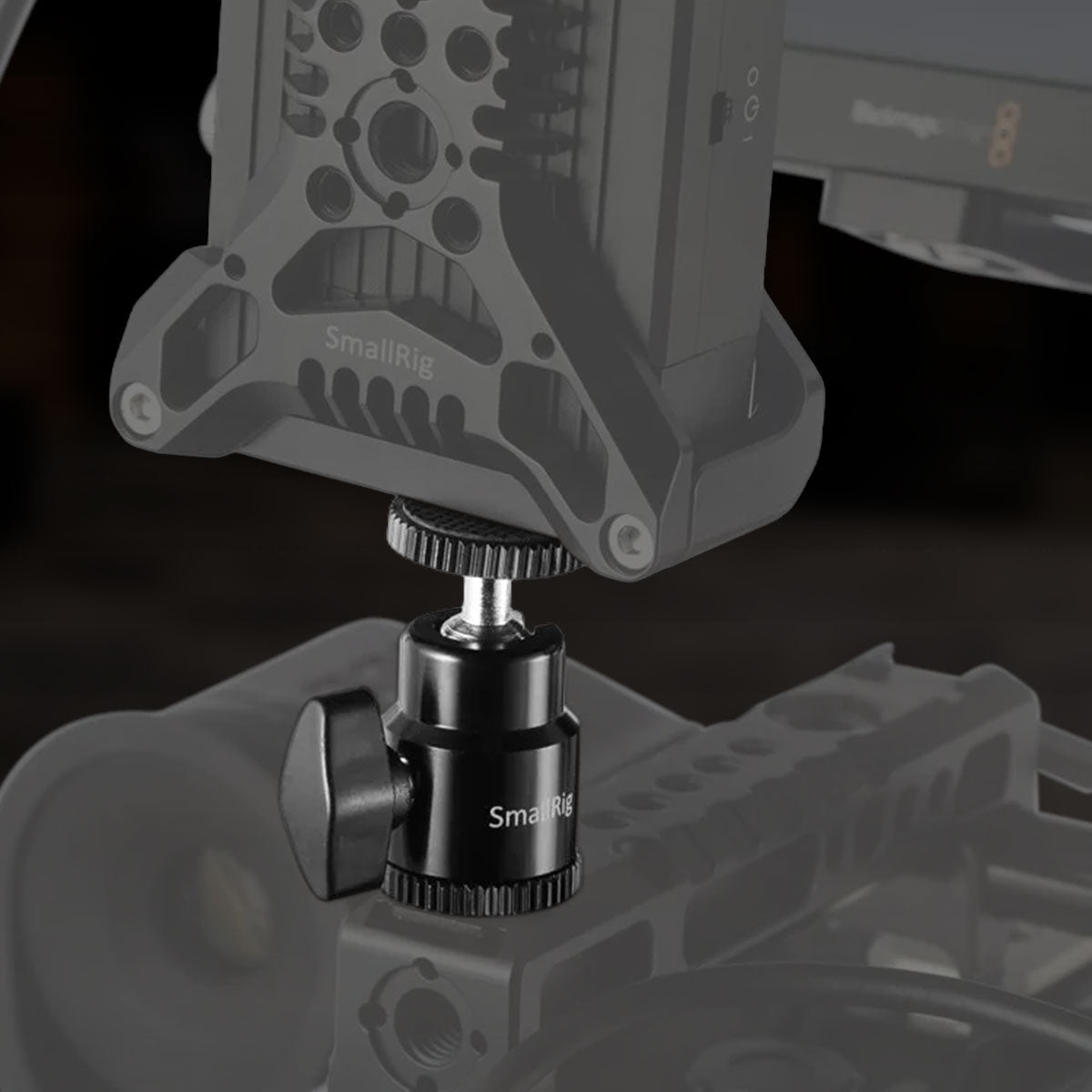 Dual ball head mounting kit installed on a camera monitor