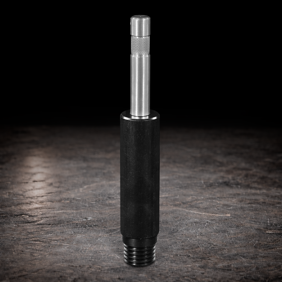 Light socket adapter to 5/8 baby pin for film studio lighting and grip rigging mounted on dark production-style background