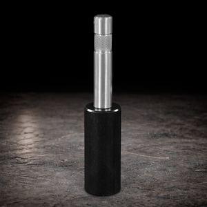 Paint stick adapter to 5/8 baby pin for film studio grip rigging and lightweight production mounting setups on dark textured background