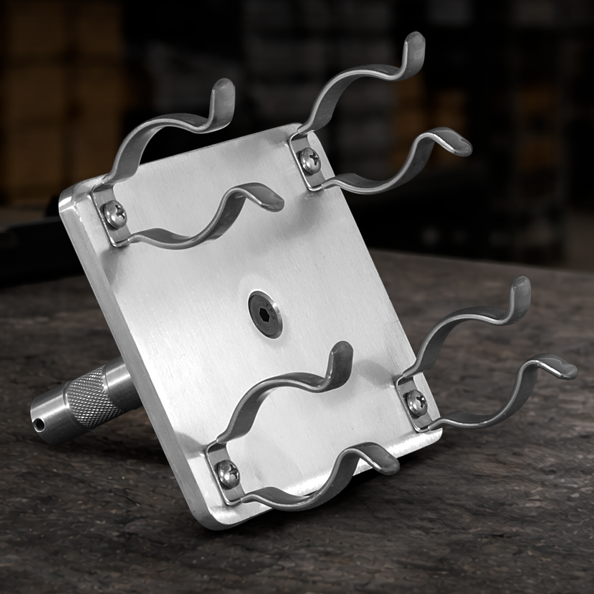 Professional T12 dual lamp holder with rubber clips and 5/8" baby pin for film, studio, broadcast, and practical lighting applications.