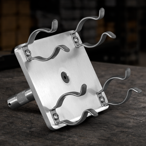 Professional T12 dual lamp holder with rubber clips and 5/8" baby pin for film, studio, broadcast, and practical lighting applications.