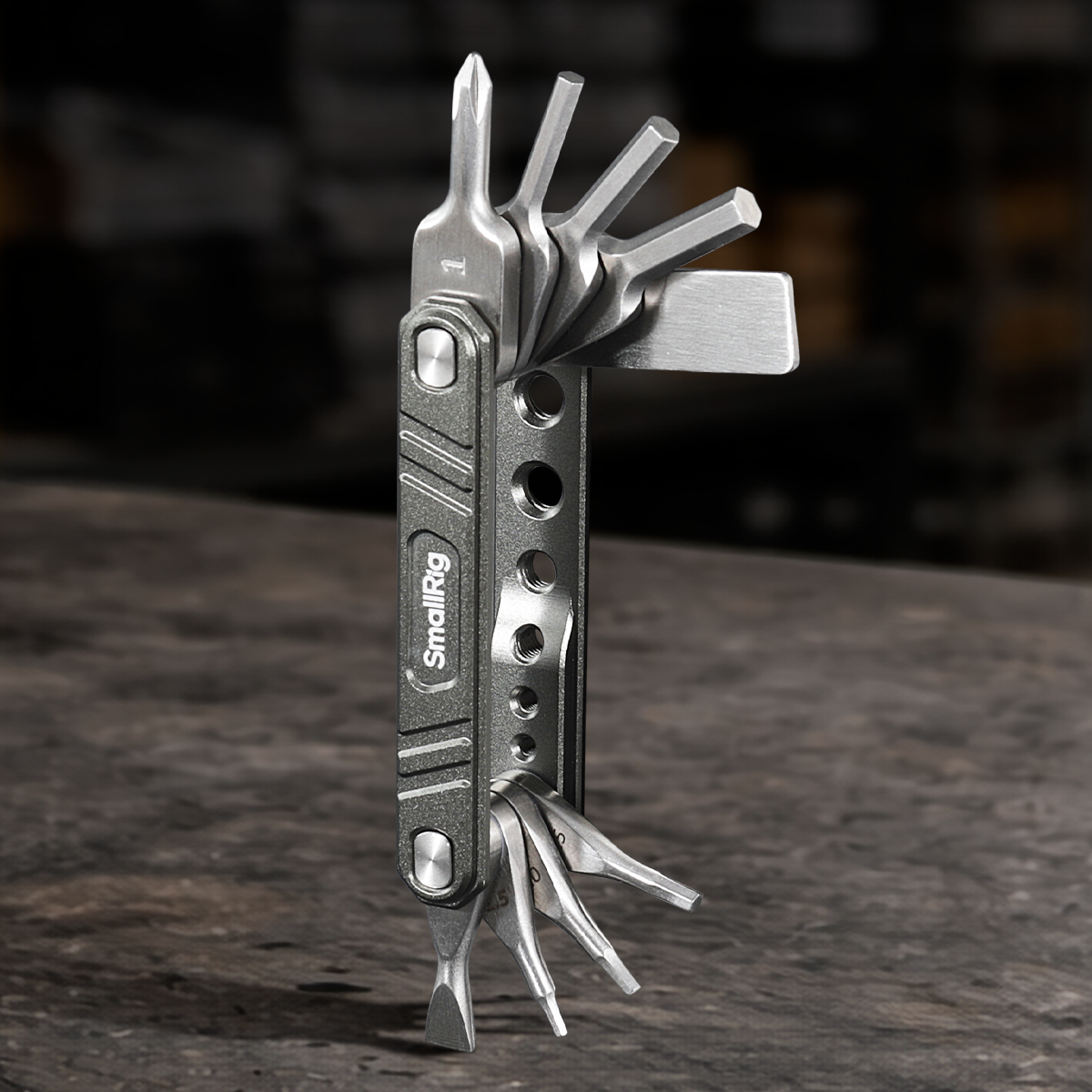 Universal 9-in-1 folding multi-tool kit with Allen keys and screwdrivers for camera rigs, cages, tripods, gimbals, filmmaking, photography, and video production.